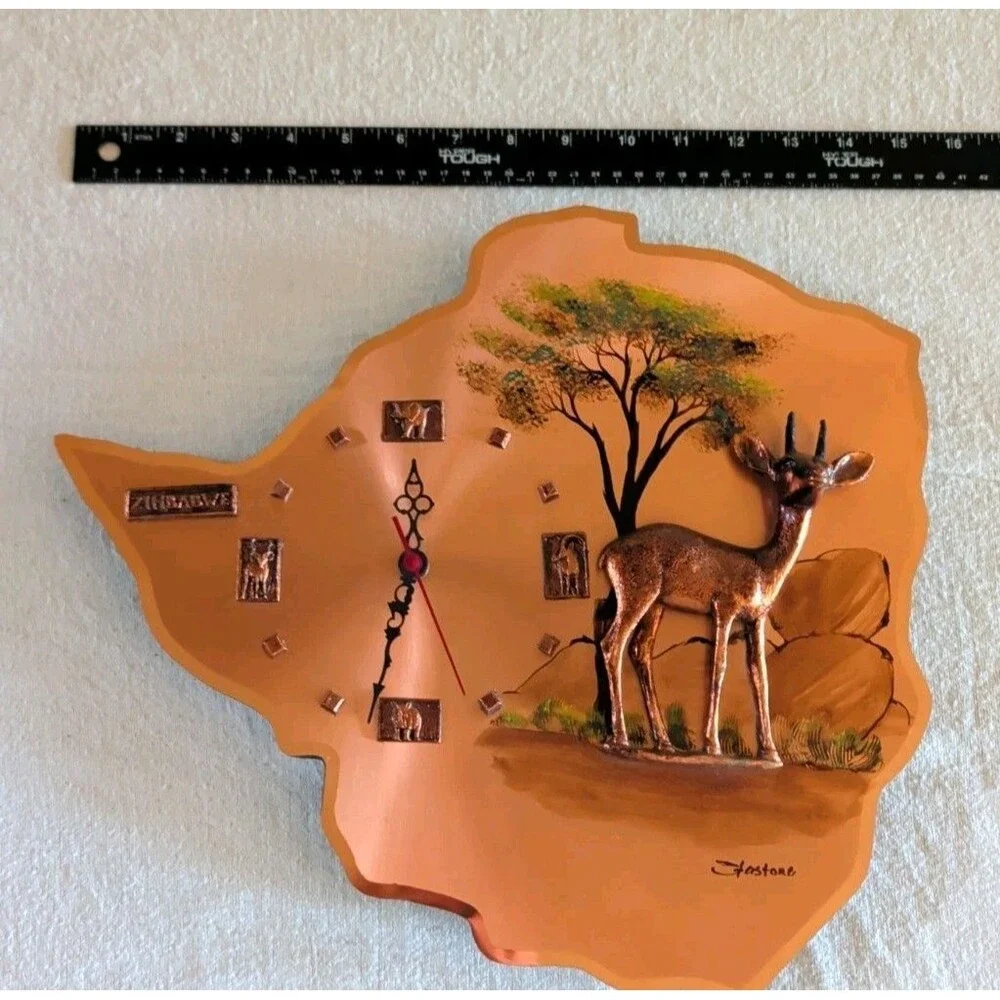 Gastone Zimbabwe Copper Brass Colored Wall Clock - Battery Powered
